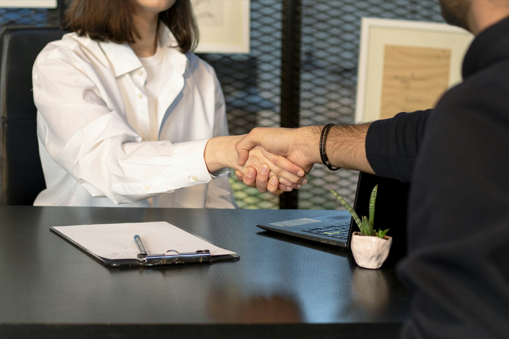 Two people shaking hands